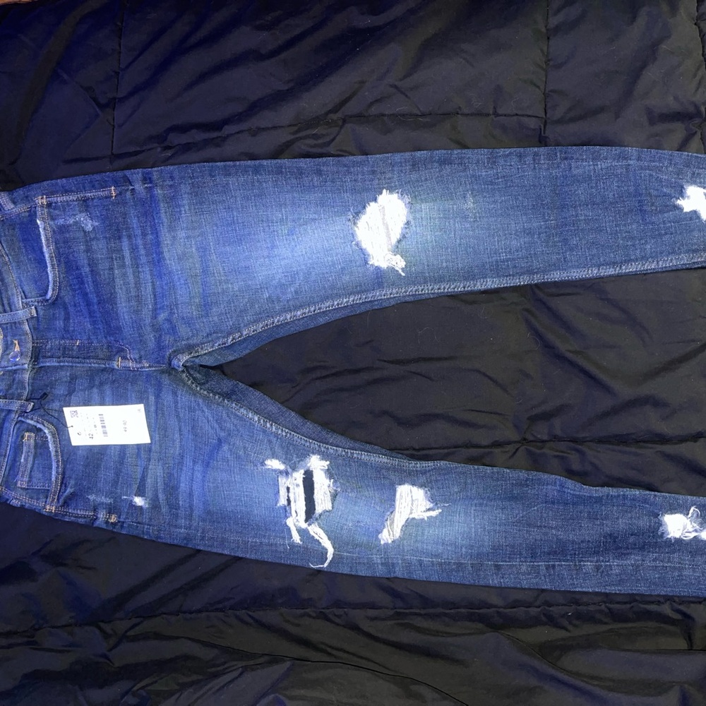 Distressed Blue Jeans